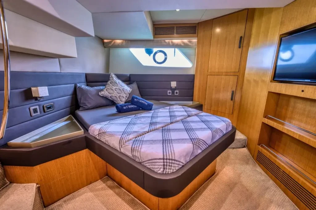 Luxury cabin bed inside My Serena 48ft yacht for private yacht rental in Dubai